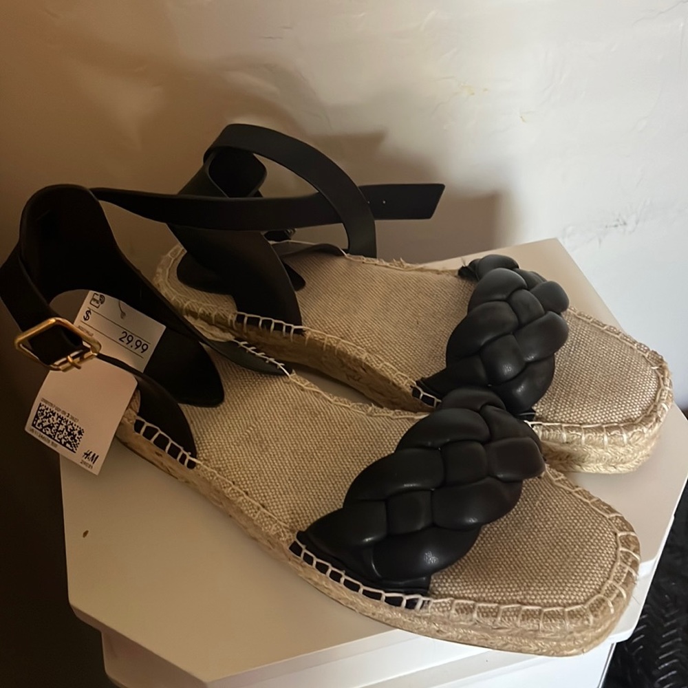 Black sandals.